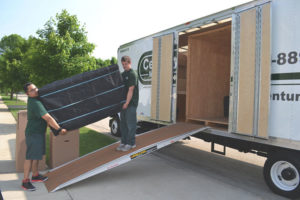Century Movers loading furniture to the truck